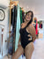 Solid color swimsuit crossed at the sides
